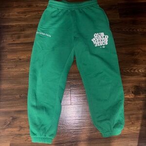 “Our World Needs Jesus” Elevated Faith Green Sweatpants